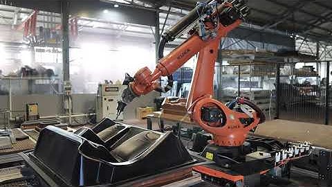 Automated process of trimming plastic parts