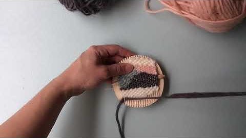 Adding fringe to a weaving