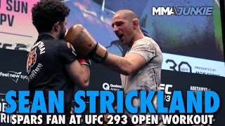 Sean Strickland Spars Fan at UFC 293 Open Workouts, Enters Crowd For Rowdy Questions