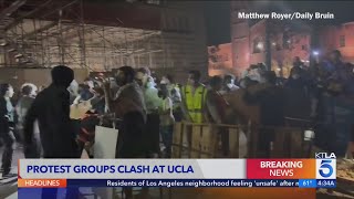 Groups clash over proPalestinian barrier blocking access to UCLA