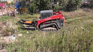The Extreme Duty Brush Cutter Cleaning up the Drainage Ditch