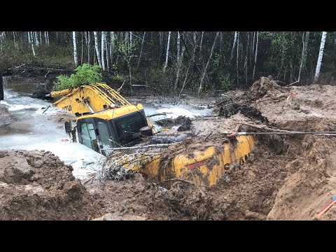 Видео: Грузовой эвакуатор и Утопленный 20т экскаватор под н новгородом