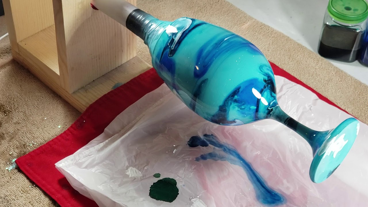 Wine bottles painted with Alcohol Ink