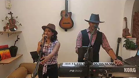 Tammy and Roy -Country Roads, take me home...