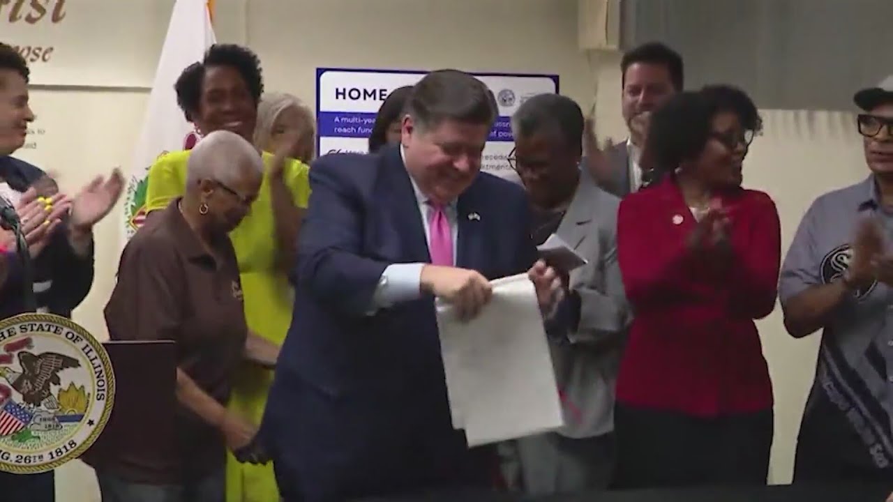 Pritzker signs bill to eliminate Illinois homelessness - YouTube