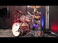 TL playing on a DW Pink Copper Custom Shop kit