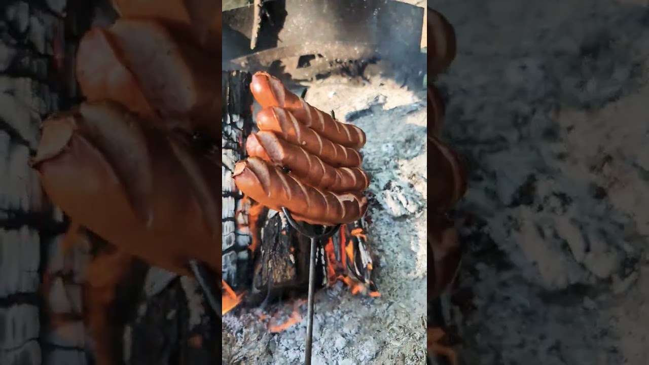 Sausages on the fire 🔥 perfection! 