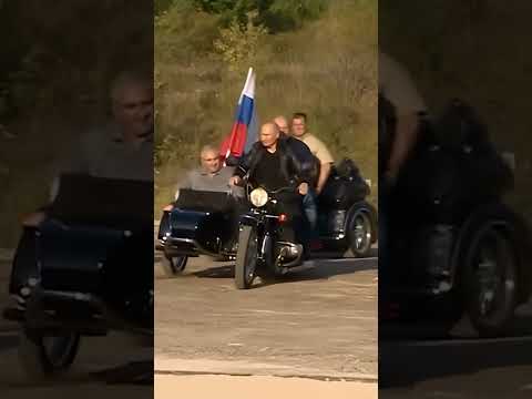 #putin #lider #presidente #rusia Putin rides a motorcycle with a group of bikers.