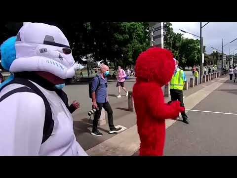 Cricket fans in Sydney mask up in style