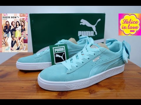 black pink and blue pumas