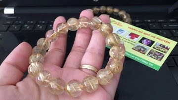 Đá quý Hà Nguyễn - vòng tay đá thạch anh tóc vàng 12 ly