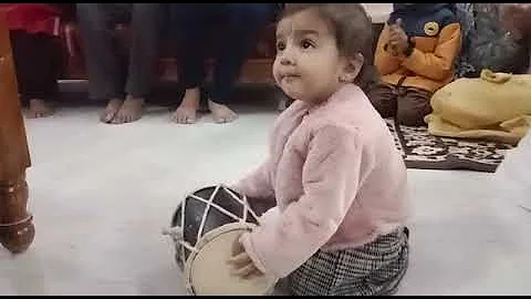 vrinda playing Mridangam.