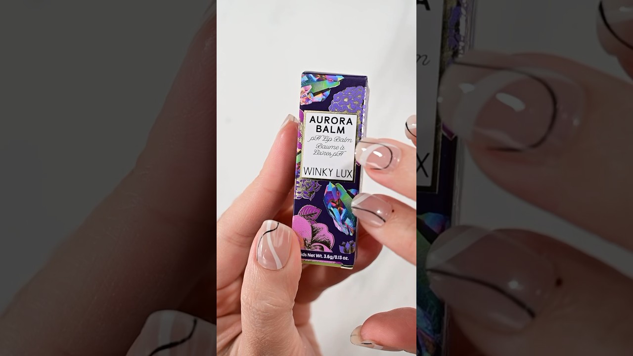 Using the new @Winky Lux Aurora Lip Balm 😍✨ use my code ‘ker20’ at 