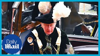 Prince Charles awkwardly drops hat during Thistle Service in Edinburgh, Scotland