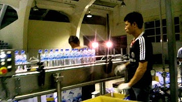 máy in phun date lên chai nước, rượu