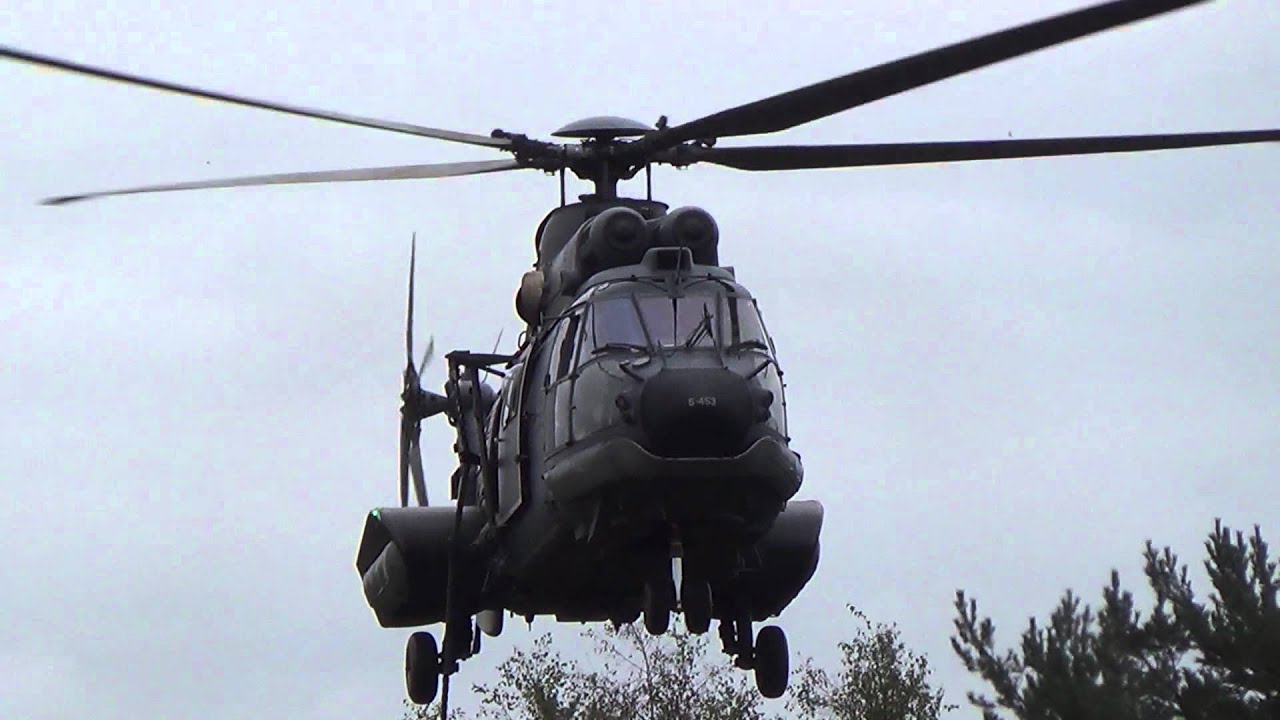 Fast rope training and lowpass RNLAF Eurocopter AS532 Cougar at ...
