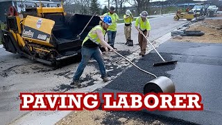 Asphalt Paving Laborers In Action