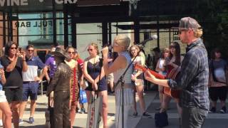 Maggie Rose sings "Body On Fire" on the steps of the Ryman Auditorium during CMA Fest 2017