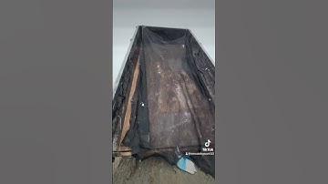 Dumping trash with the dump trailer at landfill place