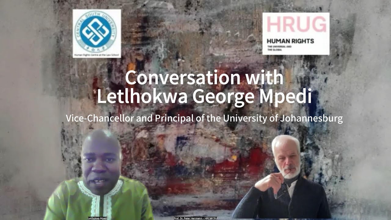 George Mpedi Letlhokwa, University of Johannesburg, talking with Peter ...