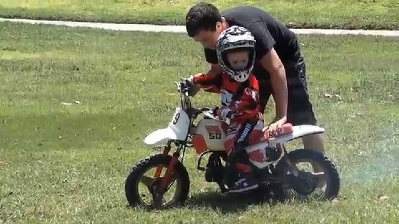 2 year old riding motorcycle