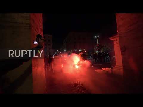 Italy: Fireworks let off, flares burn as police disperse anti-curfew protest in Rome