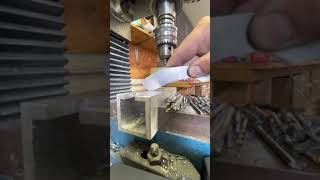 Blind tapping Titanium using a mill for 2-56 threads.