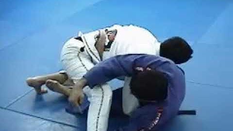 JJM ONLINE 2006 - Attacking From The Butterfly Guard with Belt Control
