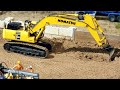 Digging a new foundation for our shop building with an rc excavator 116 scale