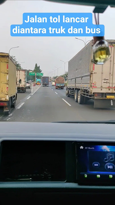 Hati-hati jalan tol lancar diantara truk dan bus. Semoga lancar jalannya, lancar rejekinya.