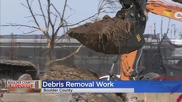Sen. Michael Bennet Tours Marshall Fire Burn Area Where Debris Removal Is Underway
