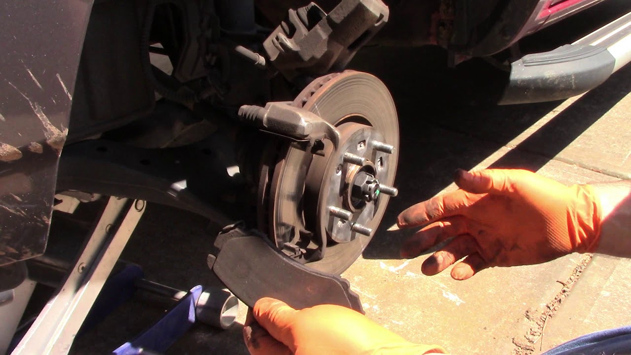 Kia Sportage front brake pad replacement. YouTube