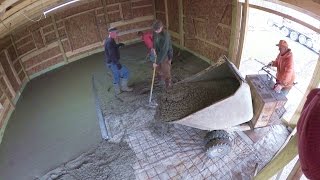 How do you pour concrete when the yard is mud soup? A concrete buggy operated by my father-in-law of course! On Friday, we 