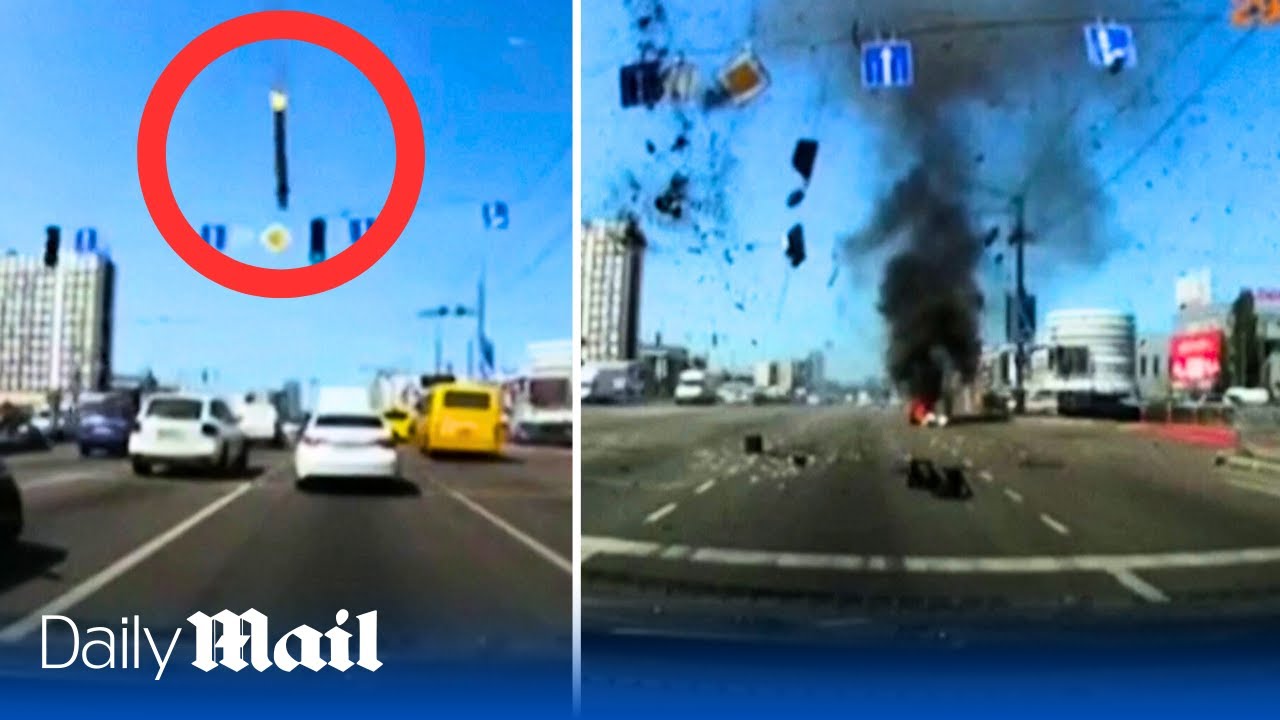 Falling missile almost obliterates cars on Kyiv road dashcam footage shows