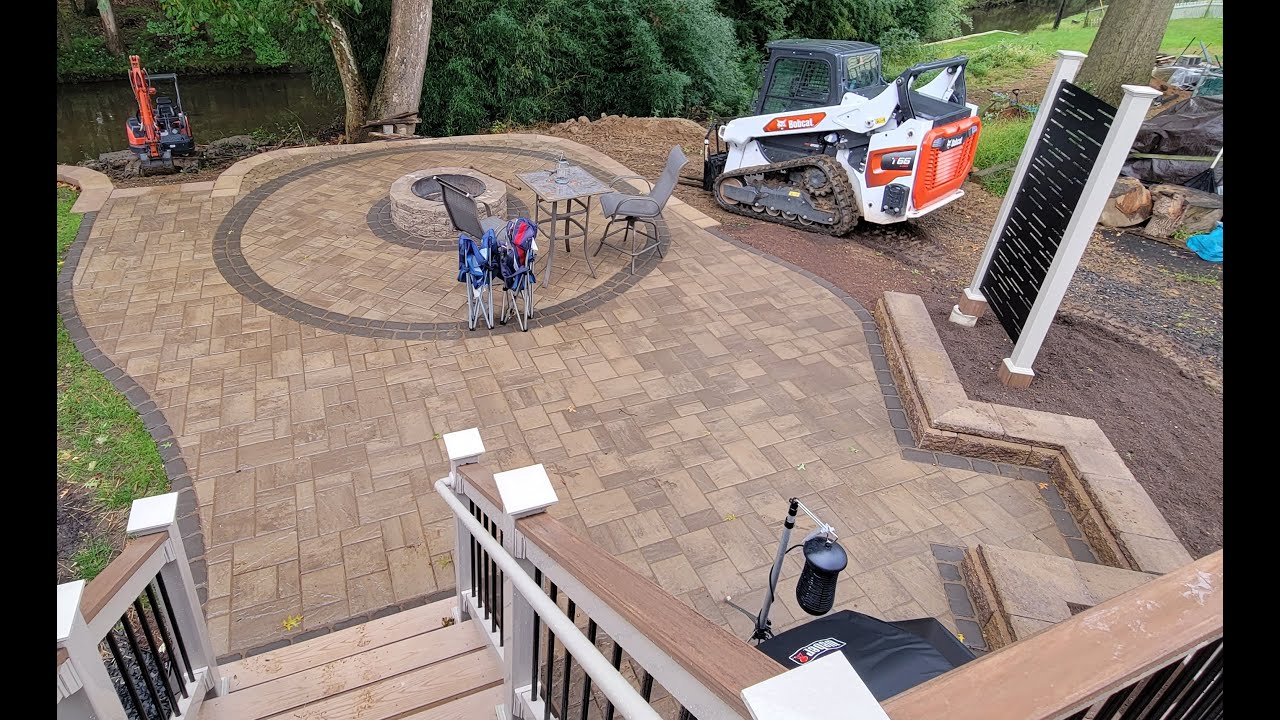 600 sq ft Paver patio installation with fire pit time lapse YouTube