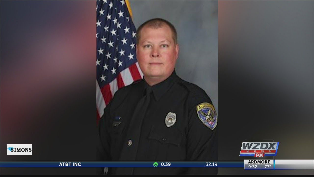 Auburn officer fatally shot, two injured