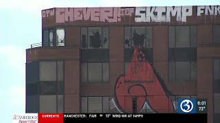 Graffiti being removed from vacant building in Hartford