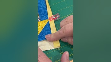 How to do a Mitered Corner when Binding a Quilt using the Backing Fabric