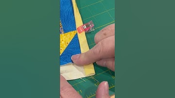 How to do a Mitered Corner when Binding a Quilt using the Backing Fabric