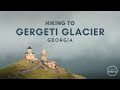 Hiking to gergeti glacier kazbegi georgia with six dogs