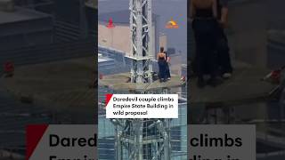 Daredevil couple climbs Empire State Building in wild proposal