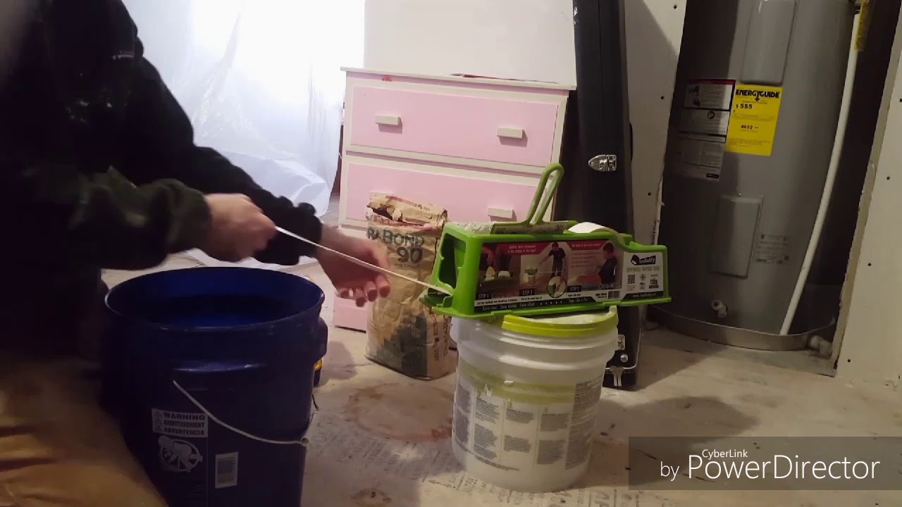 Loading a Bucket for Long Seams with a Tape Buddy Drywall Banjo Taping