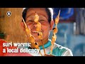 Eating larvae on a stick in Peru | METROPOLIS