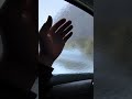 Разбил рукой стекло в машине.