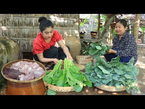 Mother and daughter cooking food / Harvest Chinese broccoli, mustard green for cooking