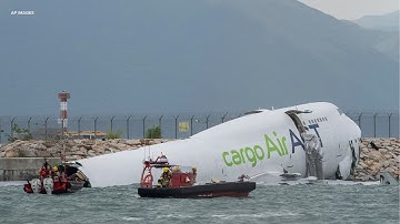 2 dead after cargo plane skids off runway and into sea at Hong Kong International Airport