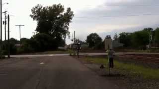 NS 6767 w/Three Sisters Leads an Eastbound Stack Train Through Chesterton