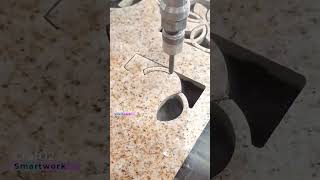 CNC Waterjet Machine Carving Patterns in Stone Slab