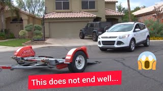 Car falls off tow dolly!   Plot twist at the end!