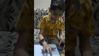 "Colorful Imprints: Unleashing Creativity with Fingerpainting - A Fun-filled Adventure for Kids!"
